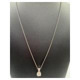 A sterling silver necklace with pendant is a