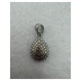 A sterling silver diamond stone cluster pendent