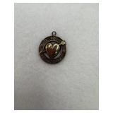 Sterling silver charm a heart pierced by an arrow