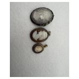 Sterling silver pendants and brooch feature