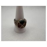 Sterling silver ring with triangular green stone.