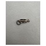A vintage sterling silver rotary telephone charm