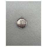 Sterling silver brocaded disc with the letter D