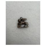 A winged lion sterling silver charm