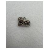 Sterling silver charm with a lion on the mountain