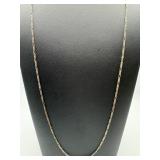 A sterling silver figaro chain *clasp is broken*
