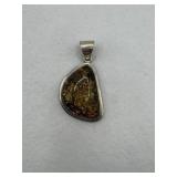Sterling silver pendant with a unique triangle