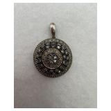 A sterling silver diamond cluster stones circle