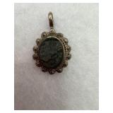 Sterling silver with green stone oval pendant