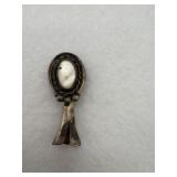 A vintage style sterling silver bell with a