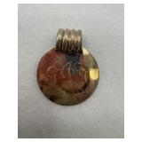Sterling silver monogram pendant with a cursive
