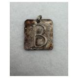 Sterling silver square with the initial ï¿½Bï¿½