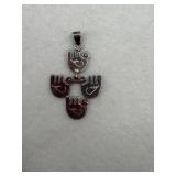 Sterling silver pendant with a unique design of