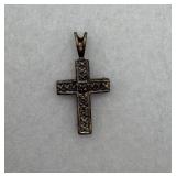 Sterling silver cross pendant with center stone