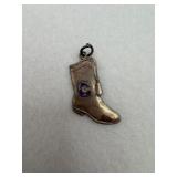 Sterling silver boot charm with a blue c logo