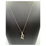 Sterling silver necklace and teardrop pendant. 18