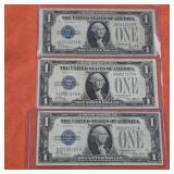 Three 1928 Blue Seal US $1 Silver Certificates