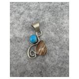 Sterling Silver Pendant with a Round Turquoise