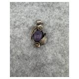 Sterling Silver Pendant with a Central Purple