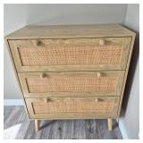 Tan Three‑Drawer Dresser with Woven Panels Tan Three‑Drawer Dresser with Woven Panels