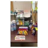 Teared rack w/ kitchen items, Lysol, cleaning