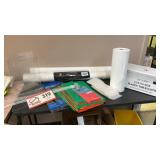 Rolls of cutter size plastic tablecloth,