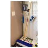 Pushbroom, Weedwhacker, blue rope, knife, boot