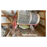 Grain cleaner with auger