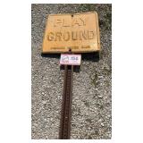 Playground sign with pole