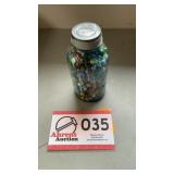 Ball glass jar of marbles