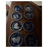These vintage aluminum coasters feature animal