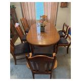 Dining room table with seven chairs