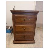 Bedside table with three drawers