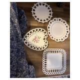 These vintage white milk glass plates feature
