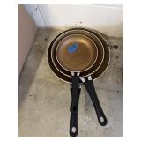 Three skillets three different sizes