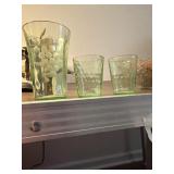 These vintage green glassware items resemble the