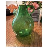 This is a vintage avocado green mouth-blown g