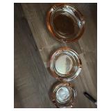This is a vintage set of 3 nesting ashtrays made