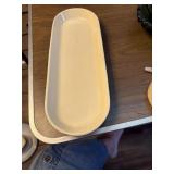 This off-white oblong ceramic tray appears to be