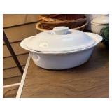 This white ceramic casserole dish with a lid