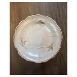This vintage Northumbria bone china saucer