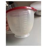 Plastic liquid measuring bowl