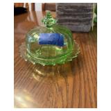 This vintage green glass covered butter dish