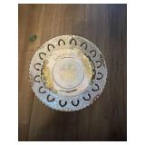 This vintage Japanese lusterware saucer features