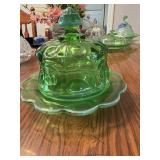 This is a green glass covered butter dish