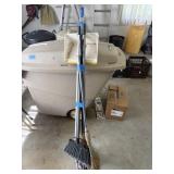 This lot has a mop, dustpan, and four brooms