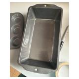 2 muffin pans and a Bread pan