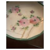 Teacup and plate it got broke. They glued it