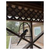 Decorative hanging items inside of screened porch