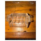 This is a vintage, clear glass sugar packet
